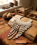 Collier Plastron en Cauris – L’Élégance Artisanale du Mali